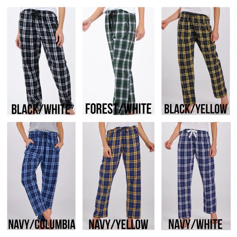 May include: Six pairs of plaid pajama trousers in different colour combinations. The available colours are black and white, forest green and white, black and yellow, navy and Columbia blue, navy and yellow, and navy and white. Each pair has a drawstring waist.