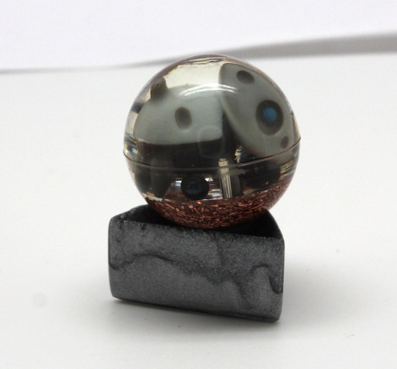 1.1 inch sphere with copper and metal bits it is chewing on Aron Steel Pokemon Gen 3 Marble Desktop Display Piece PoGo Evolves to Aggron
