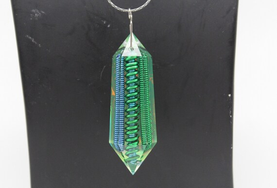 Mantis Coil - Bold Blue and Green Coils sealed inside this Elongated Gem Crystal with Iridescent Foil Back - Double Terminated Shape
