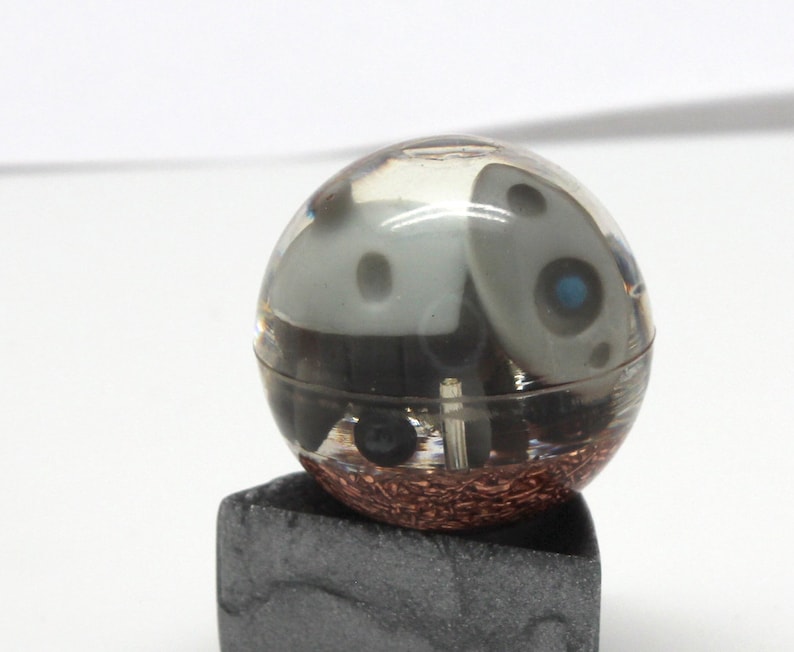 1.1 inch sphere with copper and metal bits it is chewing on Aron Steel Pokemon Gen 3 Marble Desktop Display Piece PoGo Evolves to Aggron