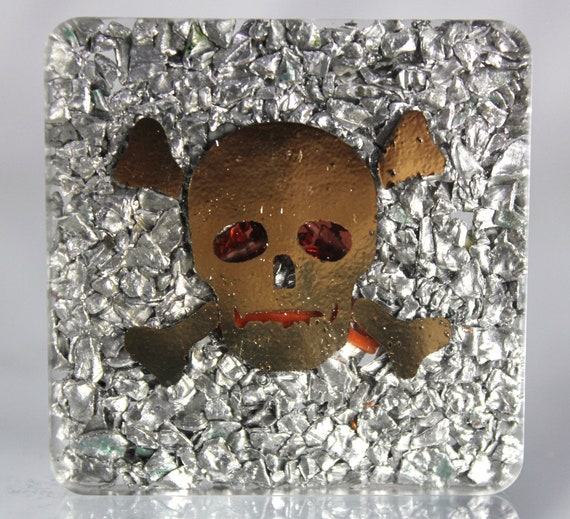 Skull and Crossbones EMF Blocker Disk Tourmaline and Red Coral on a bed of Aluminum and Shungite