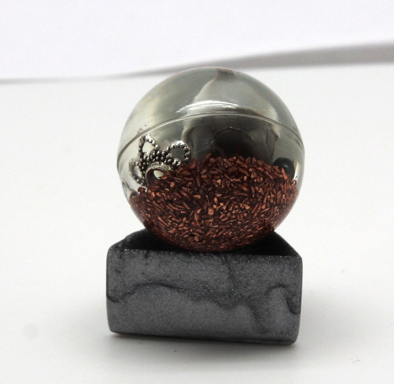 1.1 inch sphere with copper and metal bits it is chewing on Aron Steel Pokemon Gen 3 Marble Desktop Display Piece PoGo Evolves to Aggron