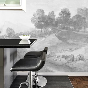 Puede incluir: Tres taburetes de bar negros con bases cromadas y asientos de cuero negro frente a una pared con un mural de paisaje acuarela en blanco y negro.