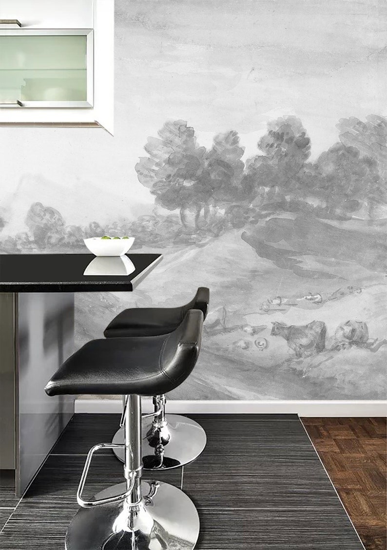 Puede incluir: Tres taburetes de bar negros con bases cromadas y asientos de cuero negro frente a una pared con un mural de paisaje acuarela en blanco y negro.