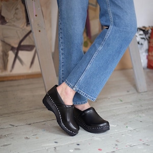 Closed-Back Black Leather Clogs: Swedish Wooden Mules