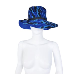Sombrero fedora de ala ancha de tela con estampado de leopardo azul real, años 70, talla 20.5", original de Dayne