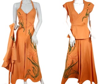 Oranje polyester jumpsuit uit de jaren 70 met airbrush-bloemen, maat M