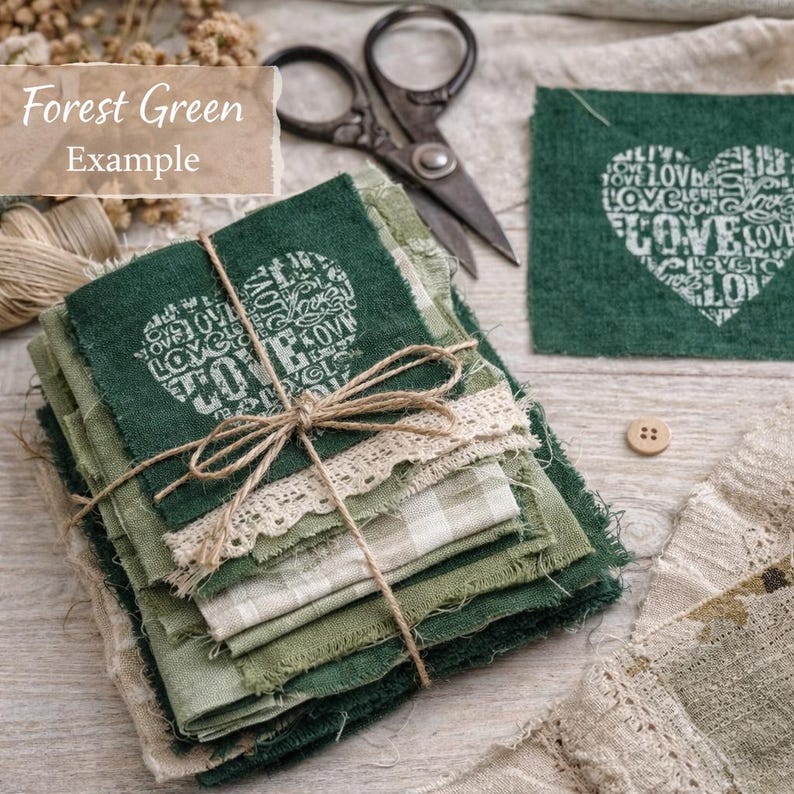 May include: A stack of forest green fabric squares tied with twine and lace, featuring a heart design with the word "LOVE" repeated. The image includes a pair of scissors and the text "Forest Green Example".