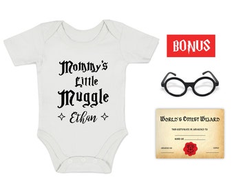 May include: White baby onesie with black text that reads "Mommy's Little Muggle Ethan" with a star on either side of the name. The onesie is accompanied by a black pair of round glasses, a red rectangle with the word "BONUS" in white text, and a certificate that reads "World's Cutest Wizard".