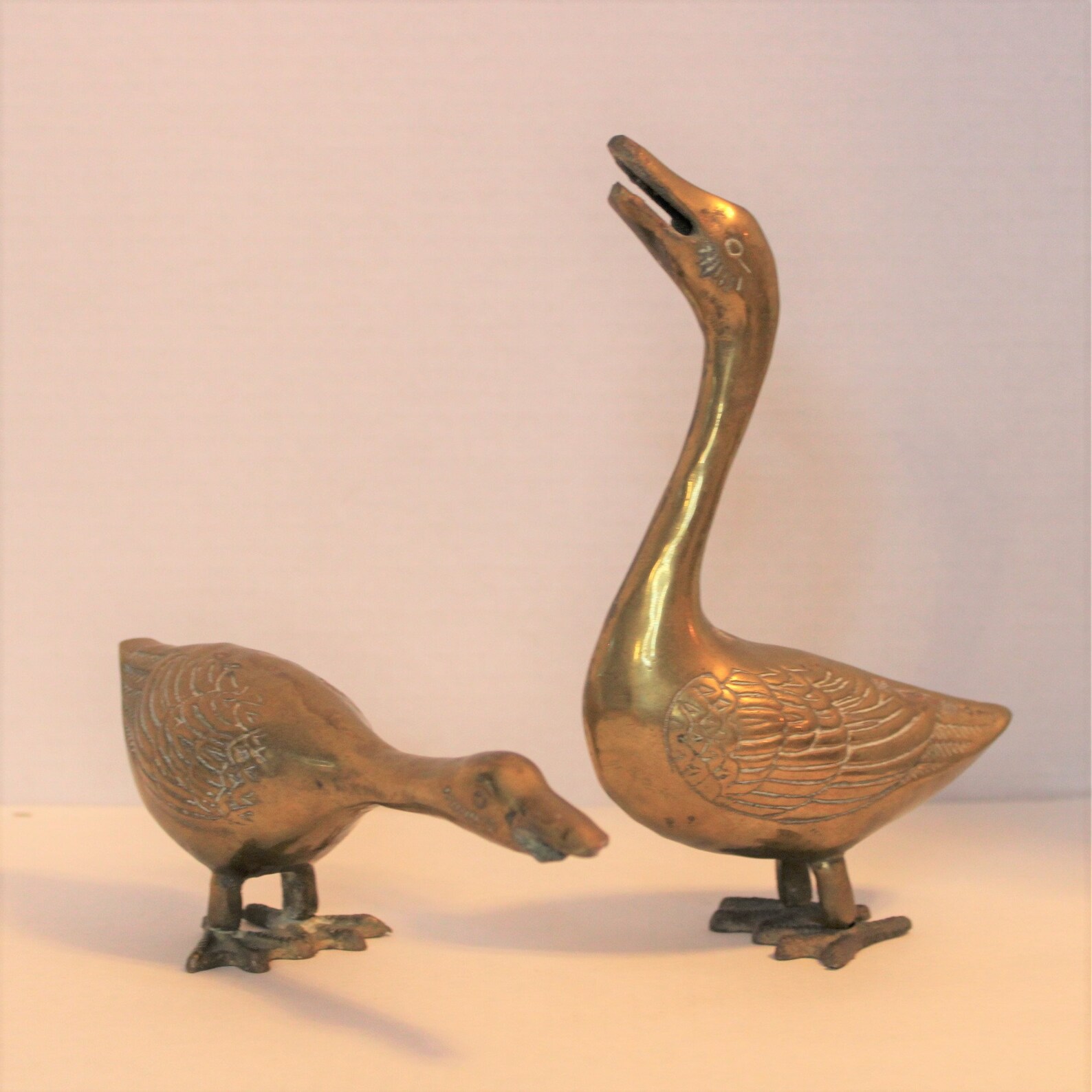 solid brass duck figurines