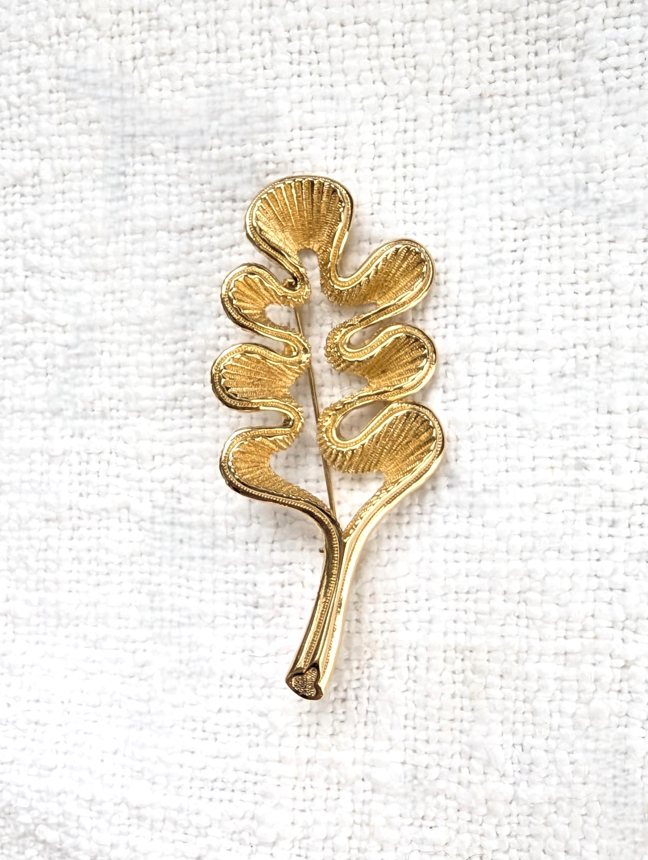 Christian Dior brooch, leaf design, gold color