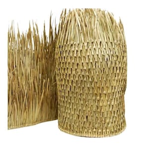May include: A close-up of a natural woven grass mat, with a textured, woven pattern. The mat is made of natural, light brown grass and has a slightly frayed edge.