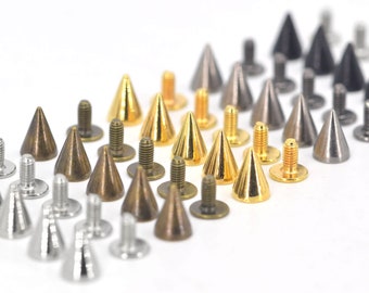 May include: Assortment of metal pyramid studs in gold, silver, and bronze colors. The studs have a flat base and a pointed top. They are used for decorating clothing, bags, and other accessories.