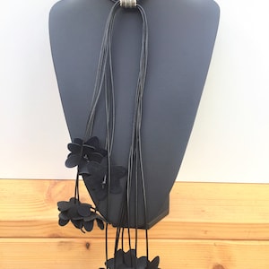 Black leather necklace "Dangling flowers", black waxed rope / Handmade Accessory by Detelini