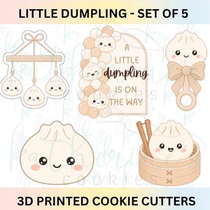 May include: A set of five 3D printed cookie cutters featuring cute dumpling designs. The shapes include a mobile, a sign with the text A LITTLE DUMPLING IS ON THE WAY, a rattle, a single dumpling, and a dumpling in a bamboo steamer with chopsticks.