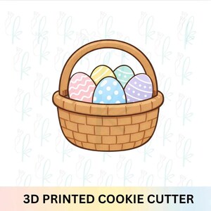 May include: A 3D printed cookie cutter shaped like a brown woven basket filled with five decorated eggs. The eggs feature pastel colors including pink, yellow, light blue, and purple with patterns of wavy lines, polka dots, and horizontal stripes.