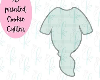 Cortador de galletas con forma de pijama de bebé anudado