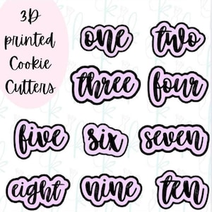 May include: A set of 3D printed cookie cutters in light purple with black outlines, each shaped like a word for the numbers one through ten in a cursive script. The text 3D printed Cookie Cutters is displayed in the upper left corner.