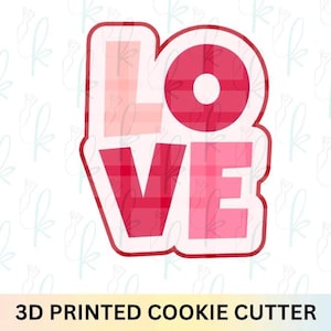May include: A 3D printed cookie cutter shaped like the word LOVE in block letters. The design features a red and pink plaid pattern across the letters, with a thick white outline surrounding the entire shape. The text 3D PRINTED COOKIE CUTTER is below.