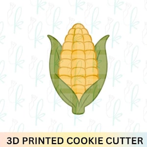 May include: A 3D printed cookie cutter shaped like an ear of corn. The corn is yellow with green husks. The text "3D PRINTED COOKIE CUTTER" is at the bottom of the image.