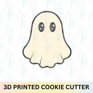 May include: A 3D-printed cookie cutter shaped like a ghost. The ghost is a pale beige colour with a black outline and two oval eyes. The bottom edge is wavy. The text "3D PRINTED COOKIE CUTTER" is displayed at the bottom.