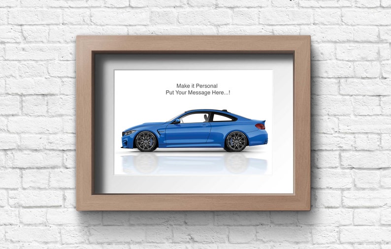 May include: A framed print of a blue car with the text "Make it Personal Put Your Message Here..." above the car.