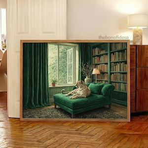 May include: A framed print depicts a leopard lounging on a green velvet chaise lounge in a room with green curtains and a bookshelf. The print has a wooden frame and the text "thebonafidesa".