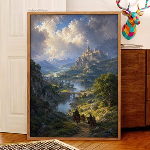 May include: A framed vertical wall art print featuring a landscape painting of a castle on a mountain overlooking a river valley with a stone bridge and three figures on horseback in the foreground, under a sky filled with large white clouds.
