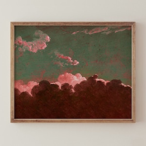 May include: A framed painting of a dark green sky with pink clouds. The clouds are clustered together in the bottom half of the painting, with a few wispy clouds in the top half.
