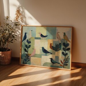 May include: A framed artwork featuring a colorful, whimsical illustration of various birds. The birds are depicted in a variety of colors, including blue, pink, and brown, and are set against a geometric background of green, yellow, and blue squares.
