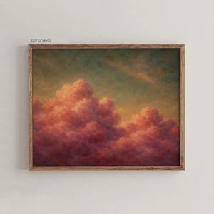 May include: A framed print featuring a vibrant cloudscape. The artwork showcases fluffy, pink and red clouds against a backdrop of a yellow and green sky. The print is enclosed in a natural wood frame, with the text "bonafidesa" in the upper left corner.