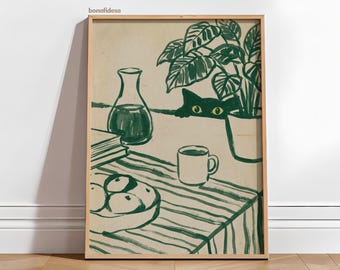 May include: A framed art print featuring a whimsical illustration. A green-hued cat peeks from behind a table with a striped tablecloth. A vase, a stack of books, a bowl of fruit, a mug, and a potted plant are also depicted. The artwork is signed "bonafidesa".