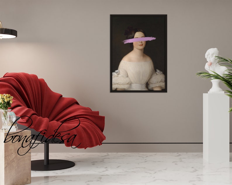 May include: A framed portrait of a woman in a white dress with a pink brushstroke covering her eyes. The portrait is hanging on a light brown wall.
