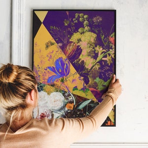 May include: A colorful abstract floral print with a geometric design in shades of purple, yellow, and blue. The print features a variety of flowers and leaves, including tulips, roses, and ferns.