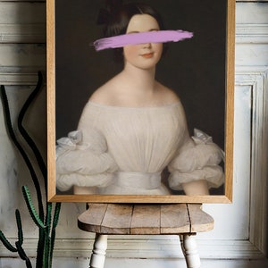 May include: A framed portrait of a woman in a white dress with a purple brushstroke covering her eyes.