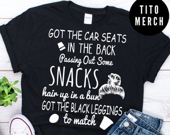 Got the car seats in the back shirt, singing in the back shirt, passing out some snacks, hair up in a bun, mom and me shirts