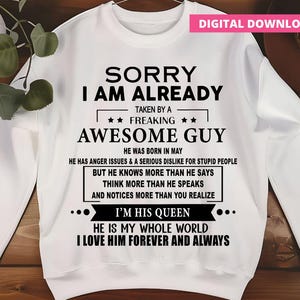 May include: White sweatshirt with black text that reads "SORRY I AM ALREADY TAKEN BY A FREAKING AWESOME GUY." The text continues with details about the person. A pink "DIGITAL DOWNLOAD" banner is in the top right corner.