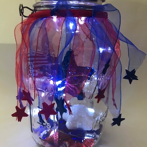 USA patriotic hanging mason jar solar lighted lantern, red, white & blue, indoor/outdoor, deck, patio, garden, table top, shelf light