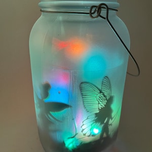 Fairy light show, frosted mason jar solar lights, flashing multi-color lights, lantern, indoor/outdoor, hanging light, patio, deck, tabletop
