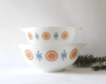 JAJ Pyrex. Two Morning Star Mixing Bowls. Orange and blue. Pyrex Glass Stovetop. 1970s Made in England Collectible Cookery and Serving