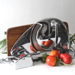 Rebanadora multiusos danesa. Rebanadora de pan EVA Denmark. Diseño vintage de cocina industrial. MCM danés.
