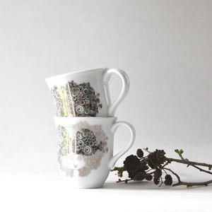 Taza de té Wiinblad, Rosalinde plateada dorada - Dos tazas coleccionables. Bjorn Wiinblad Dinamarca