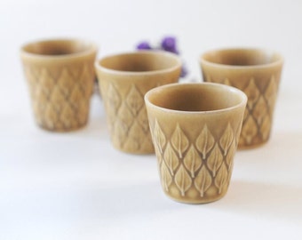 Quistgaard RELIEF. Set of four Egg Cups from Kronjyden. IHQ Danish design. Scandinavian mid century modern stoneware. Mid Mod Danish design