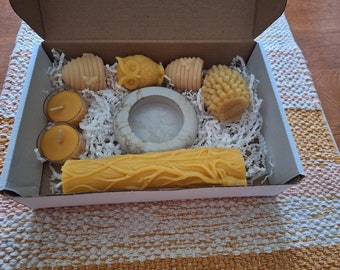 7 piece Beeswax candle  set with holder, 2 tealights, 1 votive size owl candle, 1 votive size pine cone, and 6 inch pillar and 2 beehives