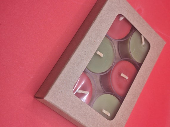 boxed tealights made from 100% beeswax in red and green