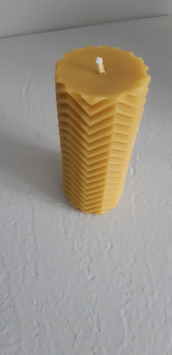 100 % beeswax candle in a pillar form. Hand poured from locally sourced beeswax