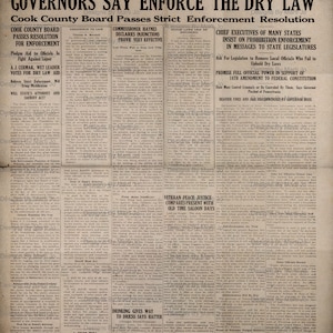 Puede incluir: Un art&iacute;culo de peri&oacute;dico en blanco y negro del 28 de enero de 1923, titulado "The American Issue" con el titular "Los gobernadores dicen que se haga cumplir la ley seca". El art&iacute;culo trata sobre la aplicaci&oacute;n de las leyes de prohibici&oacute;n y el papel de los funcionarios estatales y locales en el cumplimiento de la 18&ordf; Enmienda.