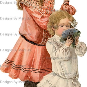 May include: Two young girls in vintage clothing. The girl on the left is wearing a pink dress with a pink bow in her hair. The girl on the right is wearing a white dress and holding a bouquet of purple flowers.