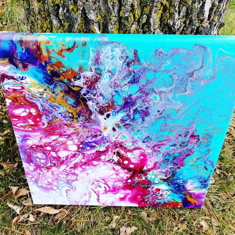 May include: Abstract painting on canvas with swirling patterns in shades of blue, purple, pink, white, and gold.