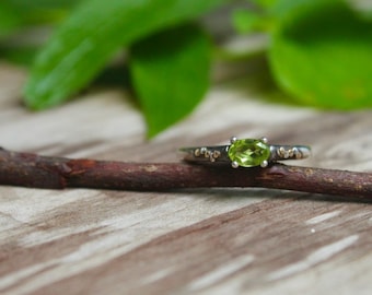 peridot sterling silver and 14k gold East to west ring